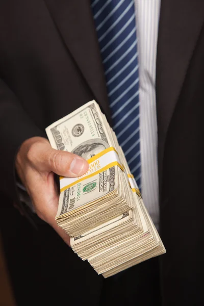 depositphotos 2734155 stock photo man handing over stack of